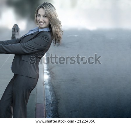 Full body portrait of smiling businesswoman in the city