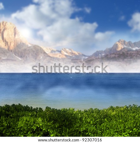 Landscape photo of a tropical paradise with blue sky, green vegetation, and majestic mountains
