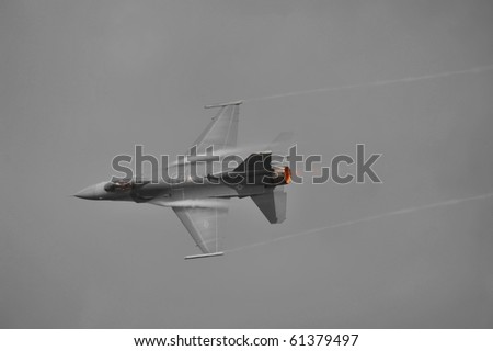 VIRGINIA BEACH, VA - SEPTEMBER 18:  F-16 Fighting Falcon zooms over the crowd at the Naval Air Station Oceana Air Show on September 18, 2010 in Virginia Beach, VA.