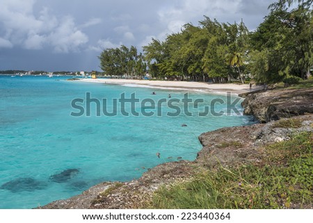 MIAMI BEACH, BARBADOS - DECEMBER 09, 2013 : People enjoying Miami Beach, on the south coast of the Caribbean island of Barbados, in the West Indies.