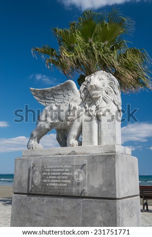 LARNACA, CYPRUS - MARCH 14, 2014 : Winged Lion statue on the promenade at Foinikoudes, in the south coast town of Larnaca on the Mediterranean island of Cyprus.