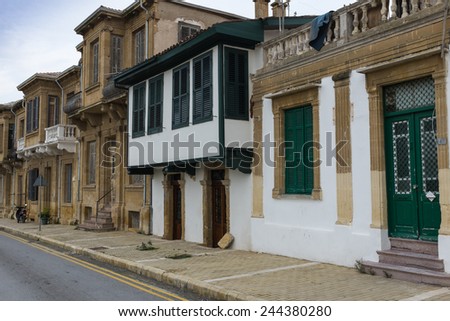 NICOSIA, CYPRUS - DECEMBER 17, 2014 : Traditional houses on a street next to the old venetian city walls in the Arabahmet Quarter of Nicosia in north Cyprus.