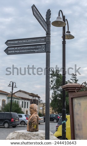 NICOSIA, CYPRUS - DECEMBER 17, 2014 : Tourist sign in the Arabahmet Quarter of Nicosia, in North Cyprus, giving directions to the local sites of interest.