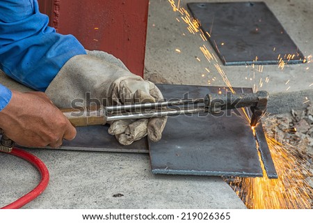 Workers Gas Cutting In the Workplace