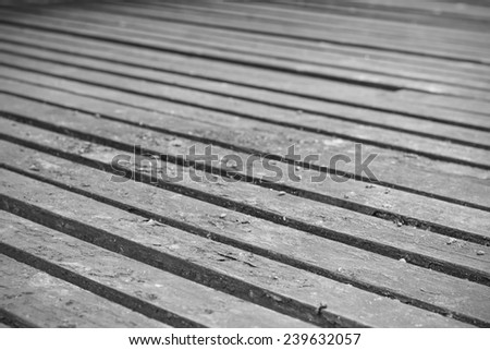 Texture of natural wooden floor use as natural background, shallow depth of field shot, black and white