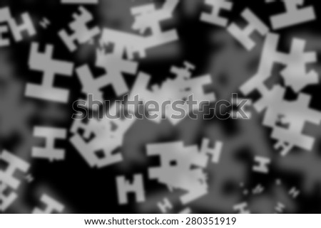 abstract gray background and  blurred English alphabet H