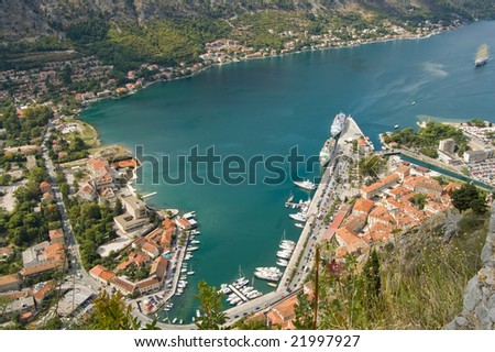 provincial town with little houses and dock in Montenegro