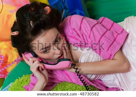 beauty girl pink phone call on color background