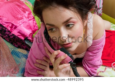 beauty girl pink phone call  on color background