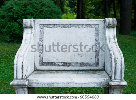 gray and dirty stone chair on the nature backgorund