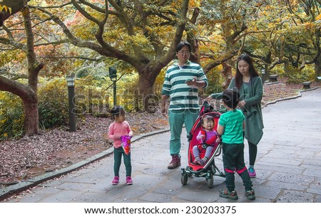 Jeju Island, KOREA - OCTOBER 12: Korean Family in Jeju Do - 12 OCTOBER 2014.