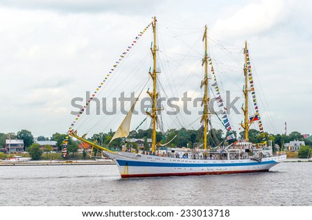 RIGA, LATVIA - JULY 28, 2013: Regatta The Tall Ships Races. Russian sailing ship Mir stays at Riga port on river Daugava.
