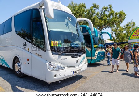 THIRA, SANTORINI, GREECE - AUGUST 14, 2013: Local buses on bus terminal in Thira town. Thira is a capital city of Santorini island