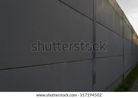 Grey concrete wall for noise insulation