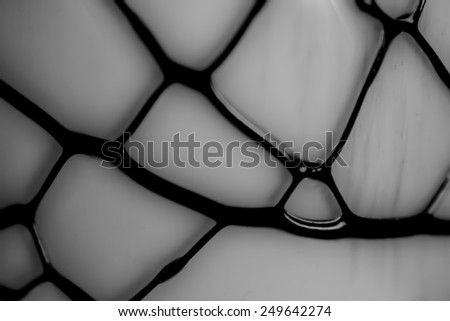 Abstract black and white background with lines on a wall