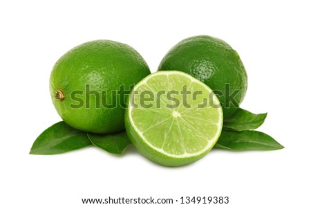 Ripe limes with leaves isolated on white background
