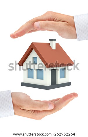 Colored private house between two businessman hands. Conceptual image