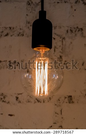 Electric light lamp Sparkling in the dark room.\
Electric movement\
Vintage light bulb