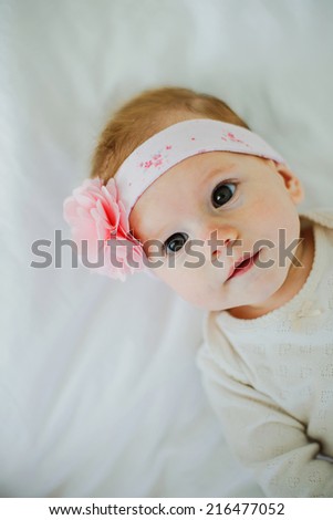 cute little baby girl with flower headband