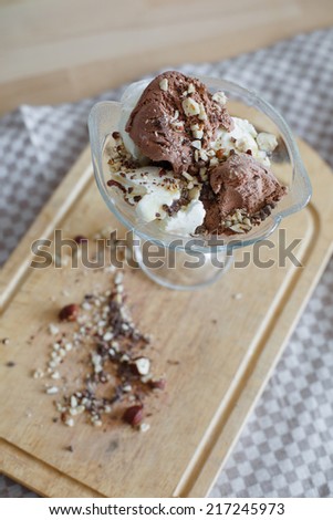 home made white and chocolate  ice cream with nuts