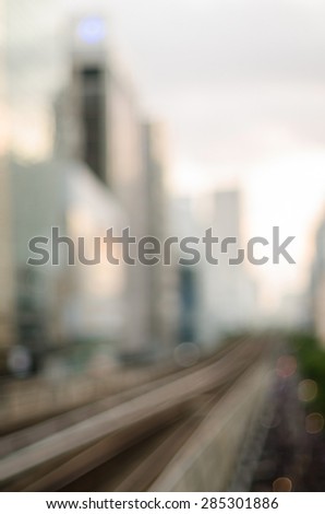 blurred photo of city scape in sunset time with light bokeh , Bangkok cityscape.