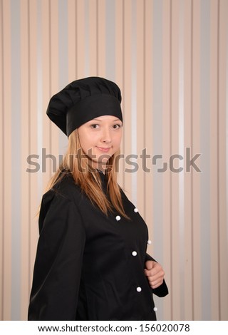 portrait of chef confectioner in black jacket