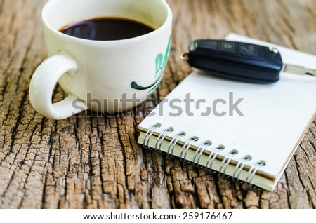 coffee break,Notebook and coffee cup on wooden board