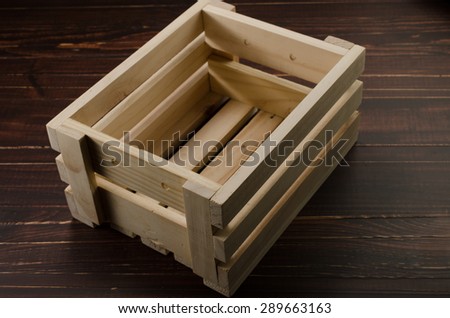 empty wooden box on wooden board background