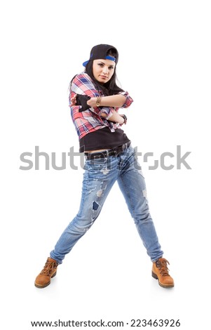 Modern hip-hop dance girl pose on isolated background. Break dance go-go girl standing on white