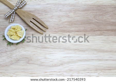 picture of fork and snack with wood background