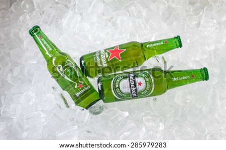 Chiang Rai - Thailand - March 27, 2015 Heineken beer on ice. Heineken is a brand of beer brewed in Holland. It is a popular and favorite of Thailand. Sold 3 Design logo on the bottles to choose from.