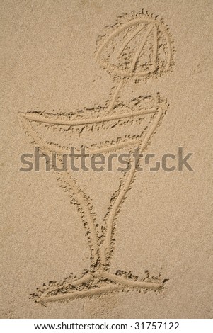 Picture of a cocktail in a glass with an umbrella sticking out, drawn on the sand on a sunny beach.