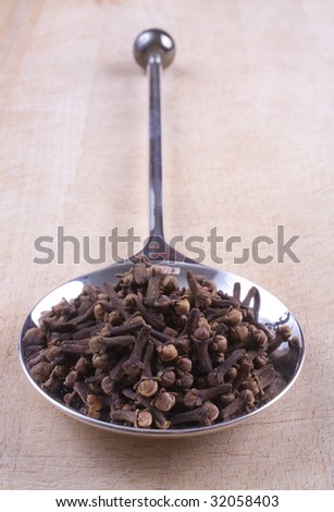 Please also check out my other herb and spice images. Cloves on spoon.