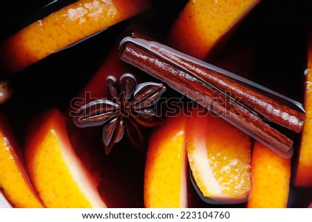 Hot mulled wine with fresh orange and fragrant spices