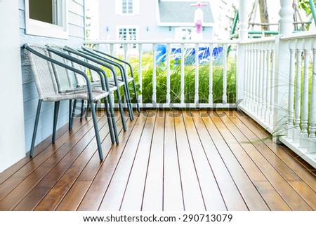 Chairs for relax on wooden front porch