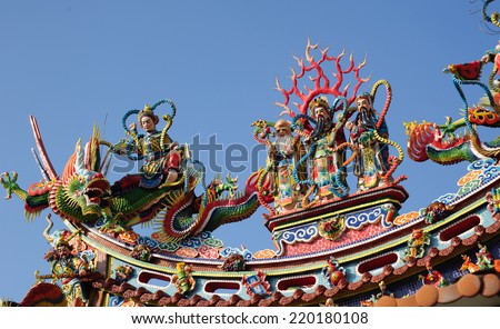 KAOHSIUNG, South Taiwan - July 8, 2014 : Decoration on the rooftop of Taiwan Temple. The Temple is open for public and welcome to take photos . Many tourist come and visit