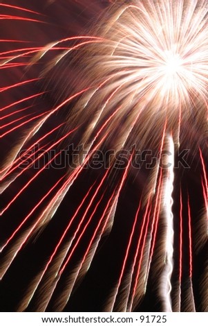 A telephoto lens and timed exposure give a different perspective on fireworks.
