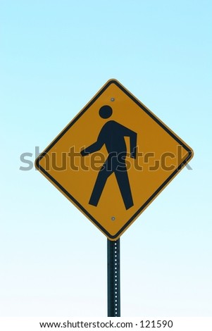 A sign warns of pedestrians.
