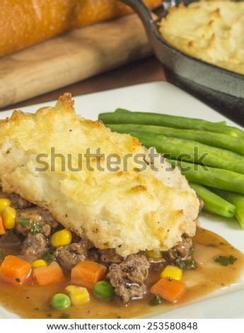 freshly baked homemade shepherd\'s pie with beef and vegetables\