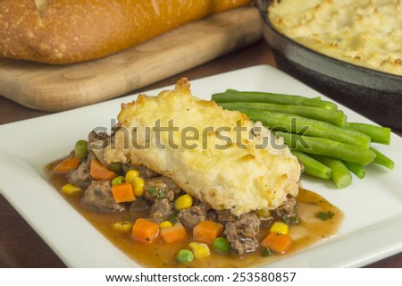 freshly baked homemade shepherd\'s pie with beef and vegetables\