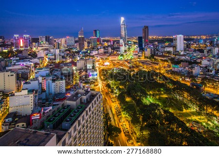 HO CHI MINH, VIETNAM - FEB 20, 2014: Downtown area and Quach Thi Trang roundabout at blue hour in Ho Chi Minh city, Vietnam. Ho Chi Minh city is the biggest city in Vietnam.