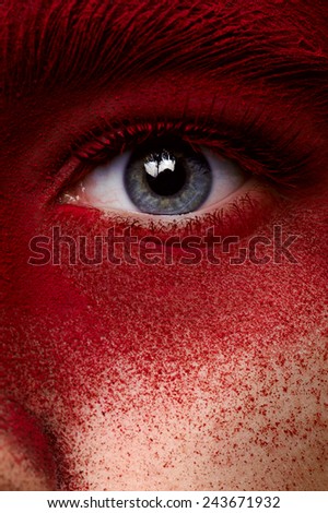 Beauty eye with red dry paint makeup