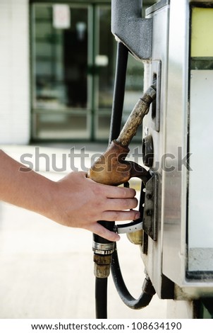 Man hand holding fuel pump