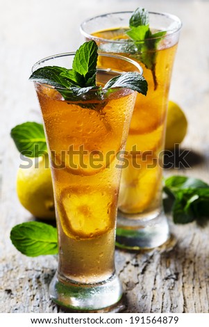Refreshing ice tea with lemon and mint