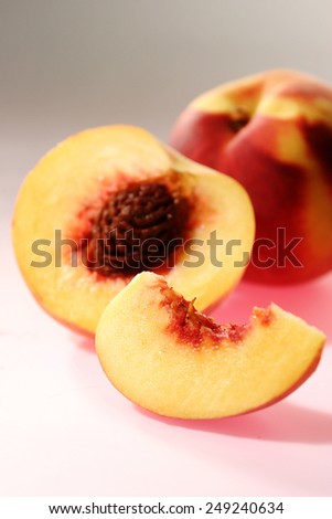 Fresh peaches like a product with de-focus in studio with white background