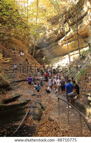 UTICA, IL - OCT 9: People enjoy a walk inside the French Canyon at Starved Rock State Park on Oct 9, 2011 in Utica, IL.