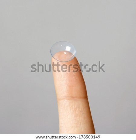 Woman with a contact lens