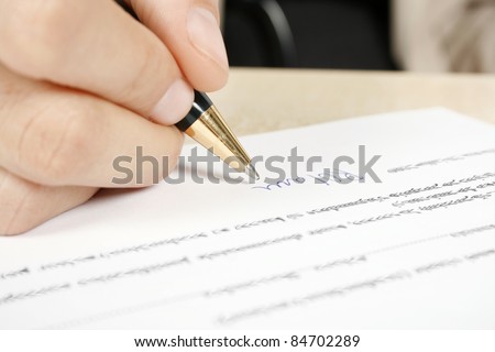 Businesswoman signing the contract