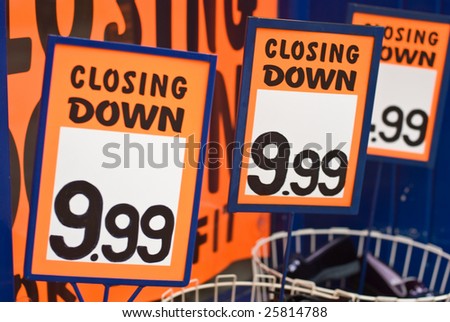 Closing down signs outside a shop