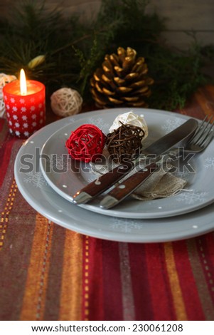 Table decoration for Christmas eve with bright table set